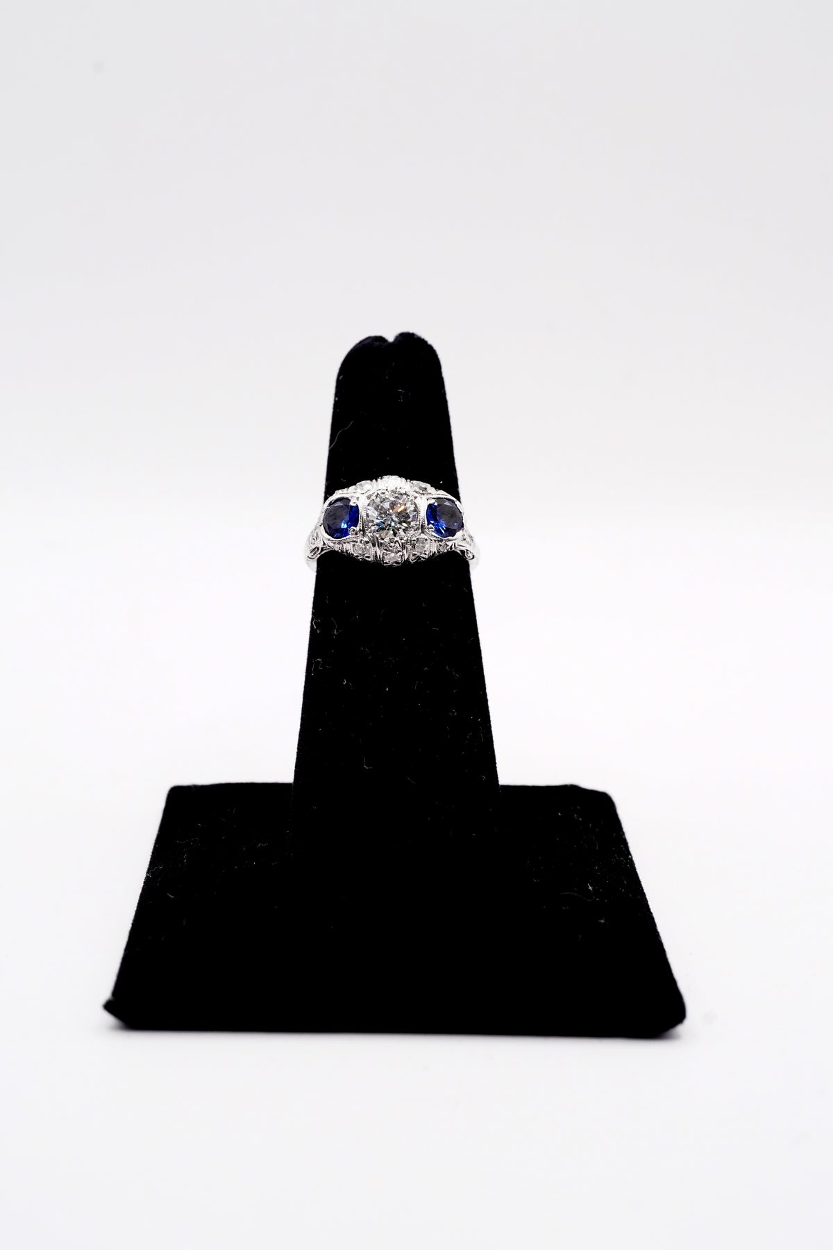 Round brilliant cut sapphire & diamond antique engagement ring